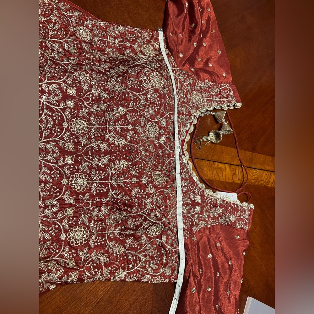 Elegant rust color lehenga with long top with crystal work - Picture 4 of 15